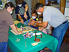 Children learning airbrushing.